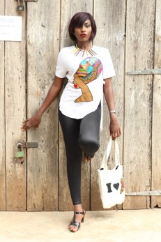 Model modelling African-inspired wears and canvas tote bag